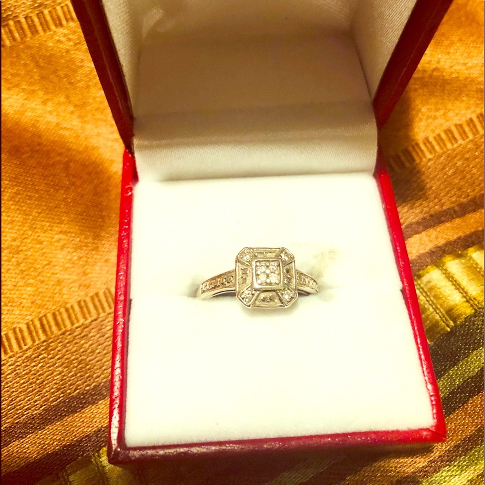 Sterling silver ring with 1/10 Diamonds